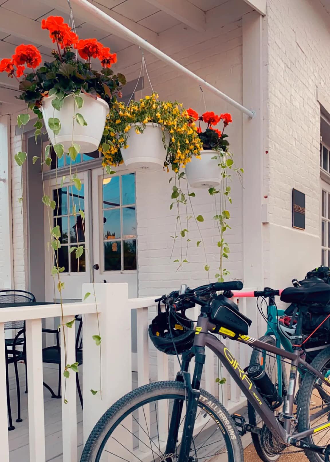 Bicycles leaning on porch at bed and breakfast on the Katy Trail